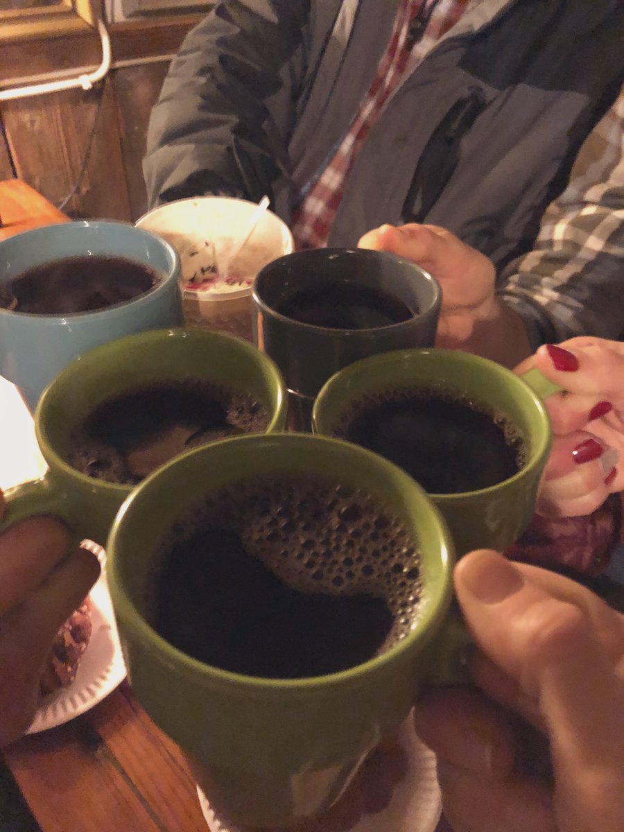 Today’s highlight in #Helsinki: homemade Cinnabons, hot #glögi, and #makkara roasted by the fire at #caferegatta #finland #SisuInSuomi #suomi