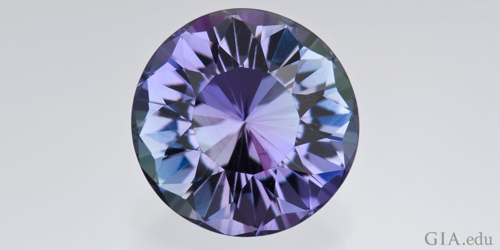 GIAnews's tweet photo. Because of its pleochroism, cutting direction determines #tanzanite's overall face-up color. When you look at it from one angle it appears blue, but from a different angle it appears purple. Learn more: https://t.co/m8JcbdX5r9 Photo: Robert Weldon/GIA. Courtesy: Meg Berry https://t.co/MabvoyaeBq