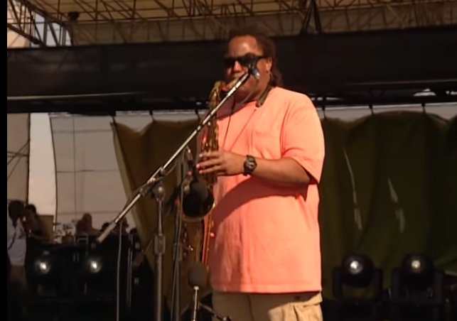 this man just ripped a fucking sax solo and did it while wearing a shirt so peach colored i believe its actually made of the essence of peach and not some sort of polycotton blend. how does one even acquire shirts made of the essence of colors? idk lmk
