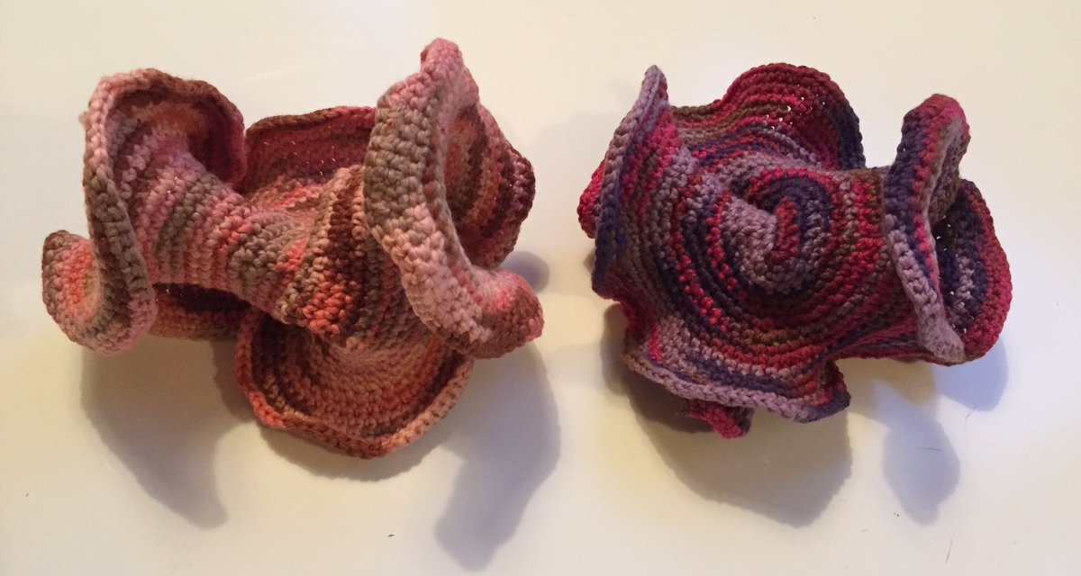 mathinyourfeet's tweet photo. 7 & 6 are kissing cousins. Both are made from the same amount of yarn. #hyperbolicplane #noneuclidean #geometry #mathart #mathyarns #mathoffthepage https://t.co/DgG92Uzphi