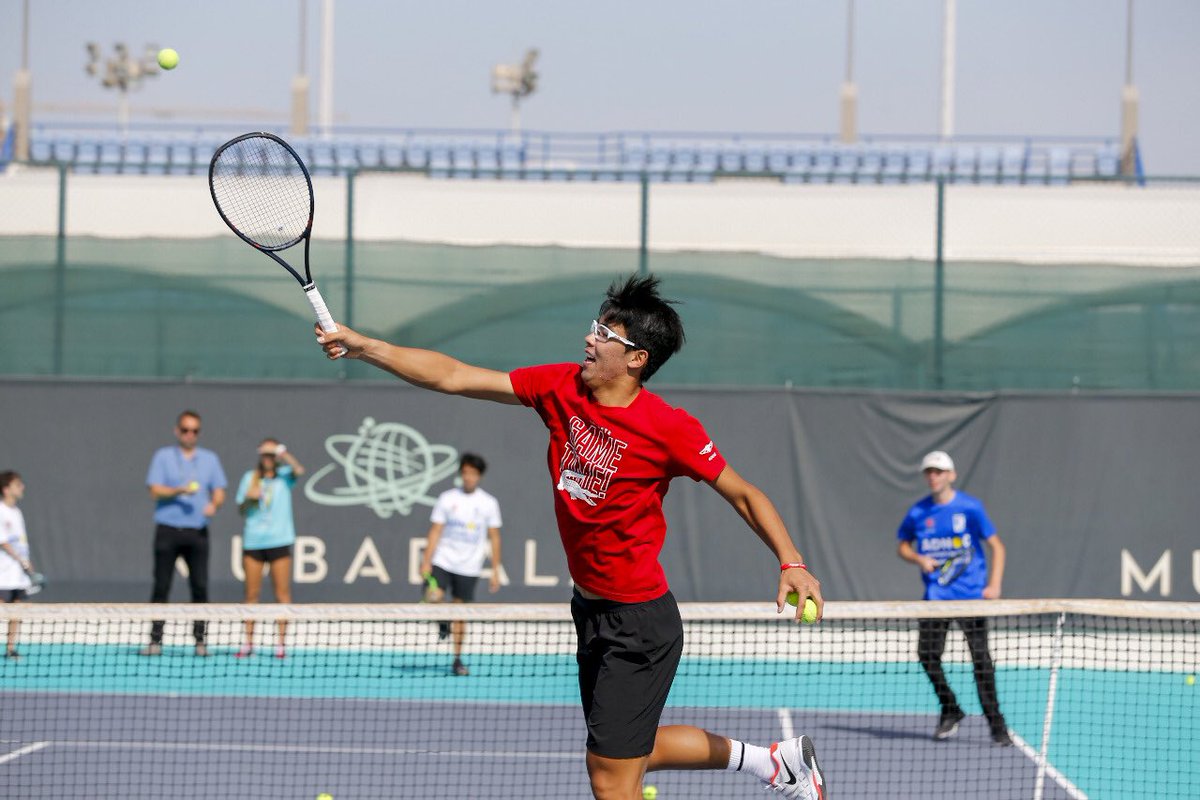 MubadalaWTC's tweet photo. .@HyeonChung with the UAE Special Olympics tennis athletes on court at the clinic today! #MWTC https://t.co/GllP35ft2H