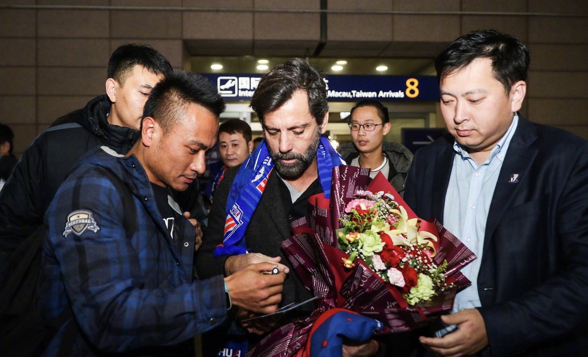 shanghaishenhua's tweet photo. Quique Sanchez Flores #QSF arrives Shanghai for the press conference tomorrow. Prior to #shanghaishenhua he headed #valenciacf #slbenfica #atleticomadrid #getafecf #alahly #alainfc #watfordfc #espanyol https://t.co/mMt3Vb90hT