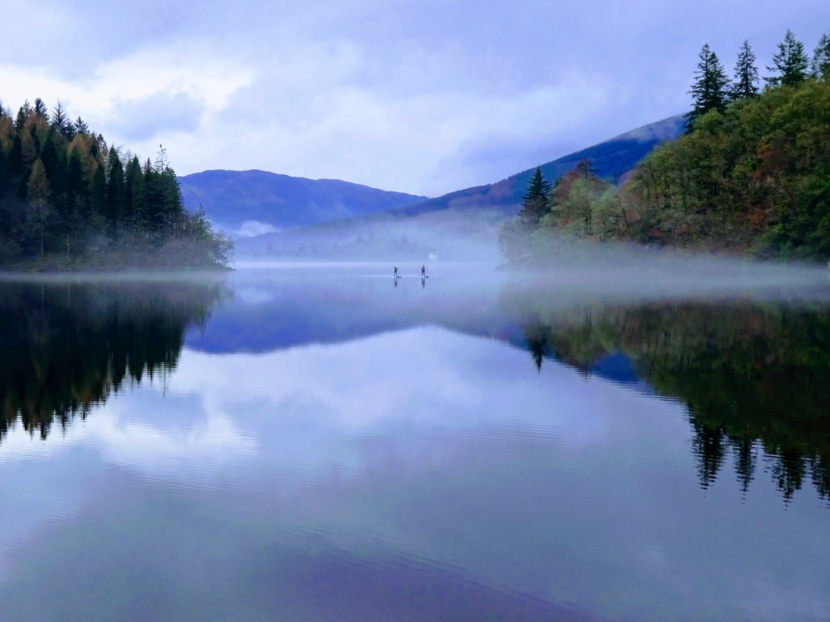 Jimmymod456's tweet photo. Paddle boarders in the mist on a still Loch Ard yesterday, near #aberfoyle in the @lomondtrossachs https://t.co/U7vL7Xbw86