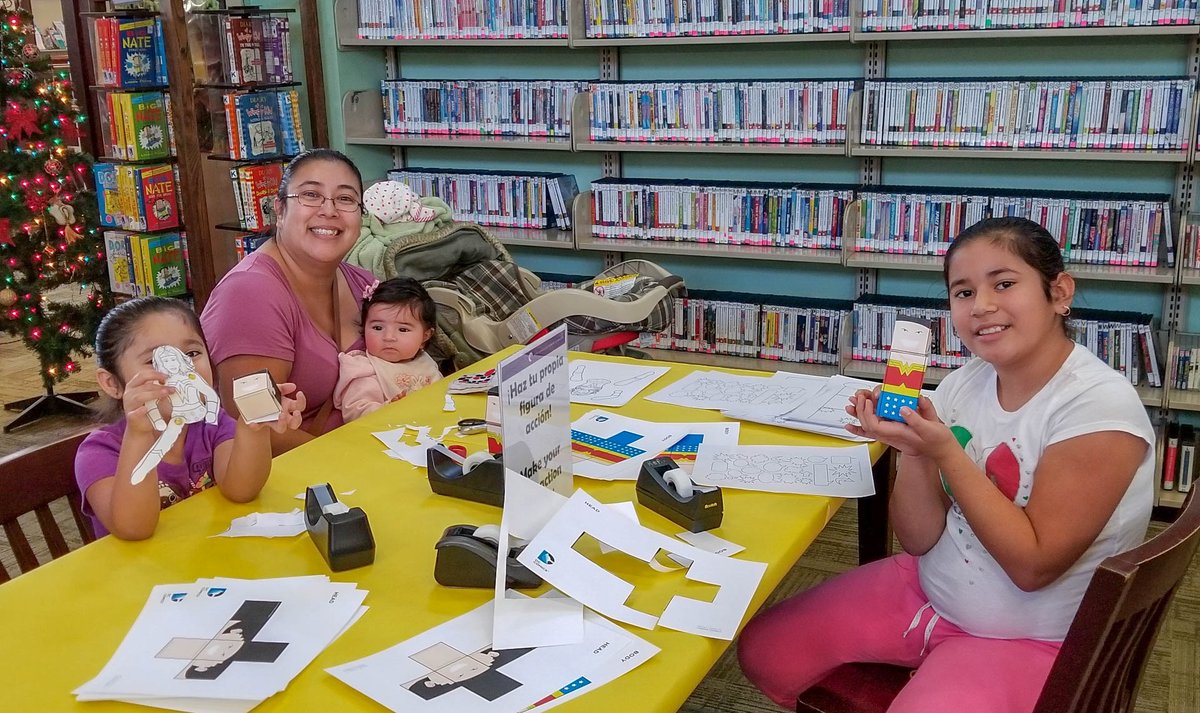 family doing crafts at the table