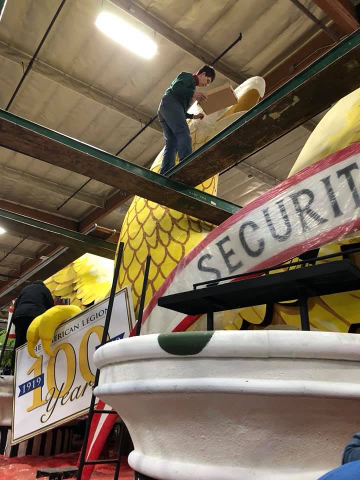 AmericanLegion's tweet photo. The American Legion centennial float was decorated today by members of The American #LegionFamily. The float will be the third in the @RoseParade lineup on Jan. 1. More info: https://t.co/bidpgRS5Xm. #RoseParade https://t.co/5ppKG2HP3X