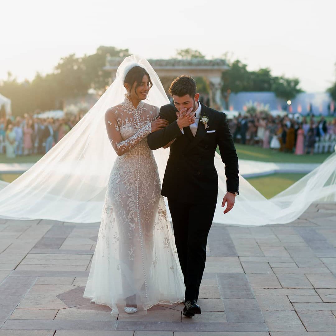 FashionWeek's tweet photo. To the bride! From #MeghanMarkle in #Givenchy to #PriyankaChopra in #RalphLauren, see what a few of the brides who said  'I do' wore in 2018. 👰 https://t.co/GZBREz940P