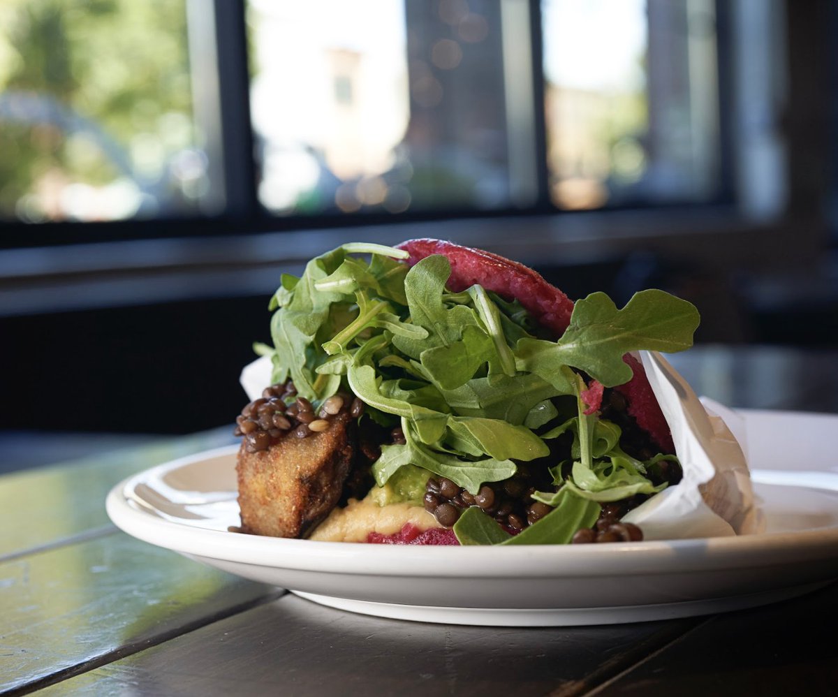 WEeatarepas's tweet photo. Taste the vegan vibes with our "La Dolce Vita Vegana" or the "Vegan Sweet Life arepa". This beet dough envelope is filled with orange-chickpea puree, fresh avocado, eggplant, black beluga lentils and mandarin vinaigrette. 🍆🥑 

#weeatarepas #veganarepa #vegan https://t.co/kbiXB6N3kL