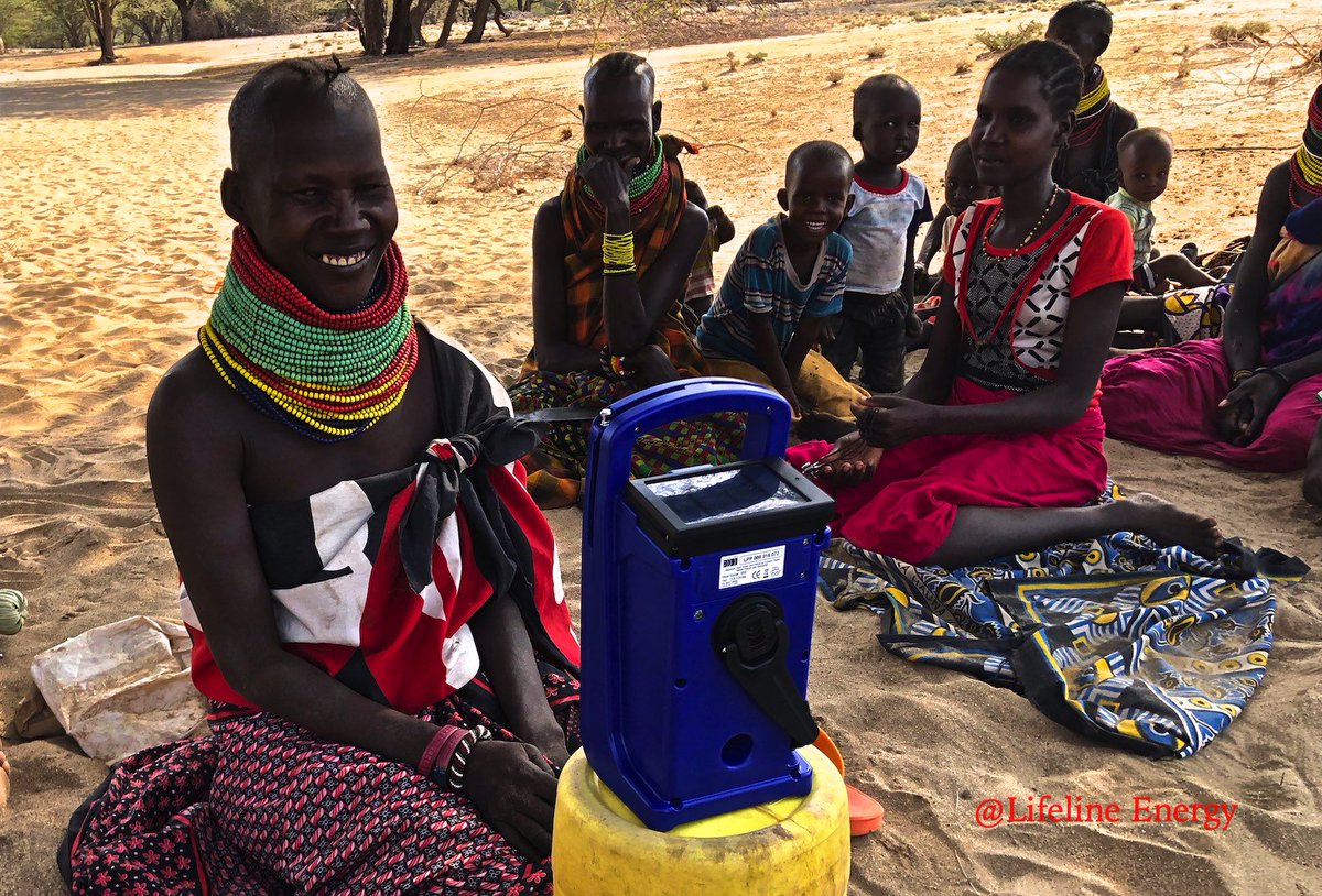 LifelineEnergy's tweet photo. One of our best 2018 memories. Presenting our #solar #Lifeplayer MP3 to a Turkana women's group in #Kenya. None had #radio access. Our hosts @MercyCorpsKe run an initiative to help women build enabling environments to create economic opportunities. #womenpower #commisaid https://t.co/vXcHGdspnw