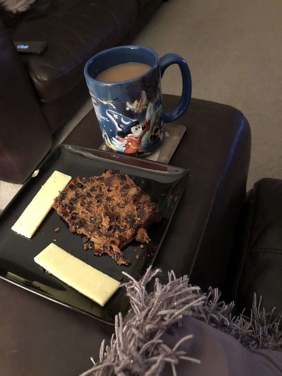 LargishG's tweet image. So many people out and partying hard!! Here’s me with my Christmas cake and cheese. Oh, and obligatory cuppa. #old #notbothered