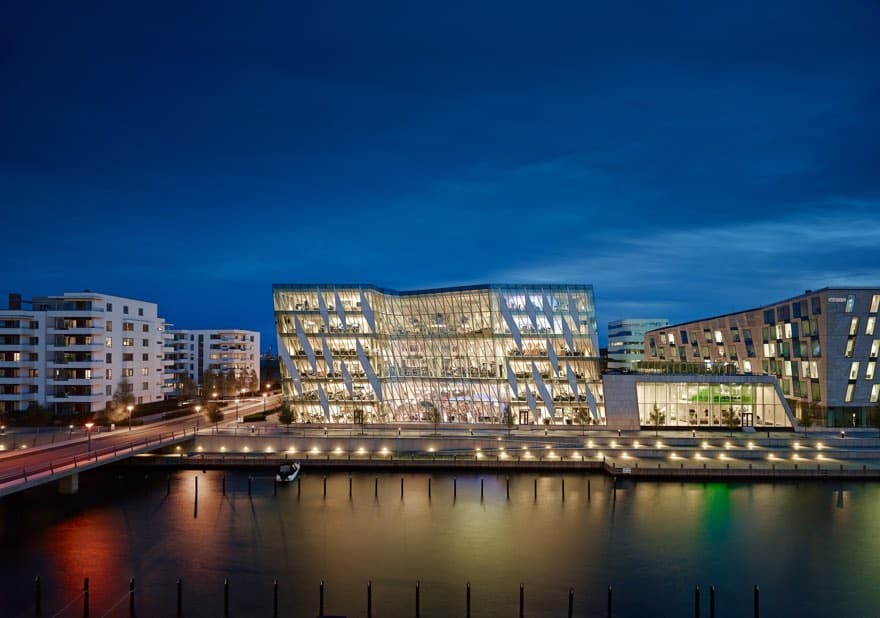 #SaxoBank #Headquarters Colours of sea & sky in #greenglass #whitefaçade elements interchange in cut-up #structure vs a lot of #Xshapes reminiscent of letter X in name of the Bank. Inside, #transparent inspiring environment dominated by open plans enhances sense of team spirit.