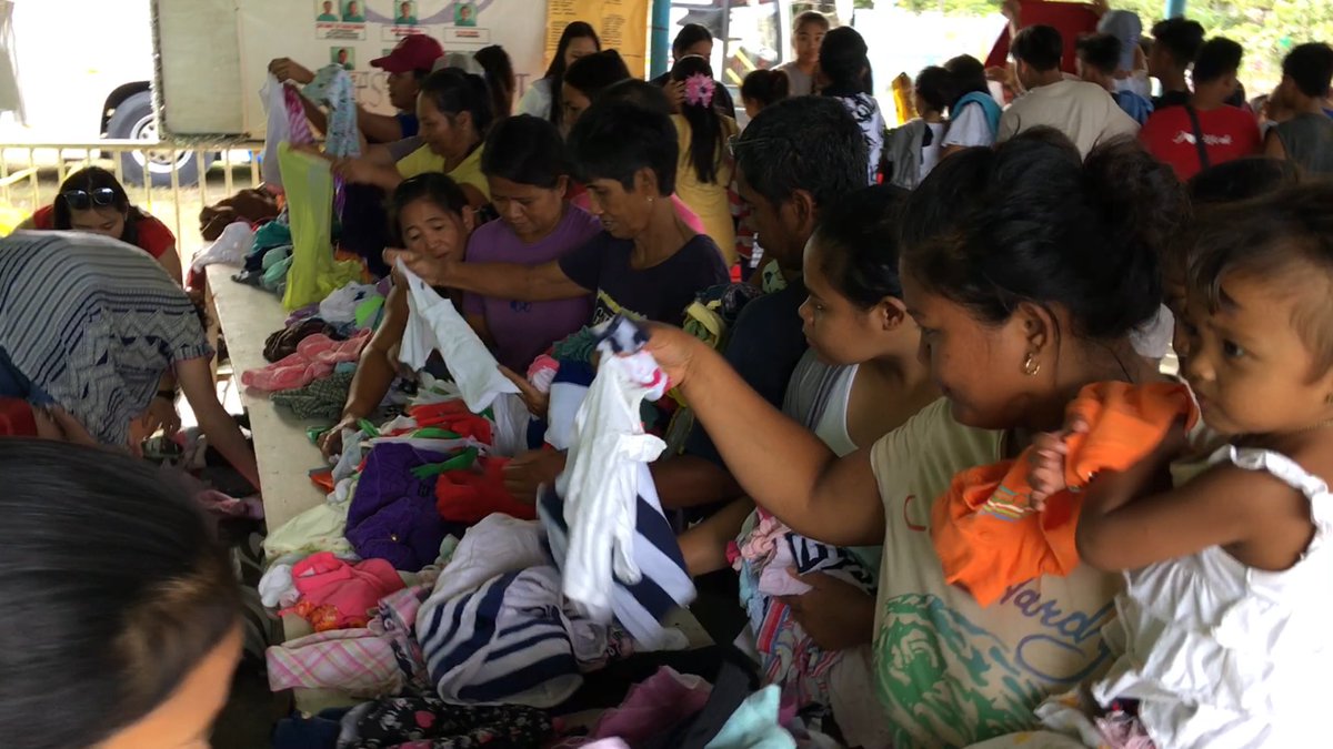 MikeCLeadership's tweet photo. While in Tarlac, Philippines, our @TCDSB student leaders set up a free Christmas market with their donations for the people in the village. #PH2018 #CatholicStudentLeadership #FaithInAction https://t.co/XahDFskMpg