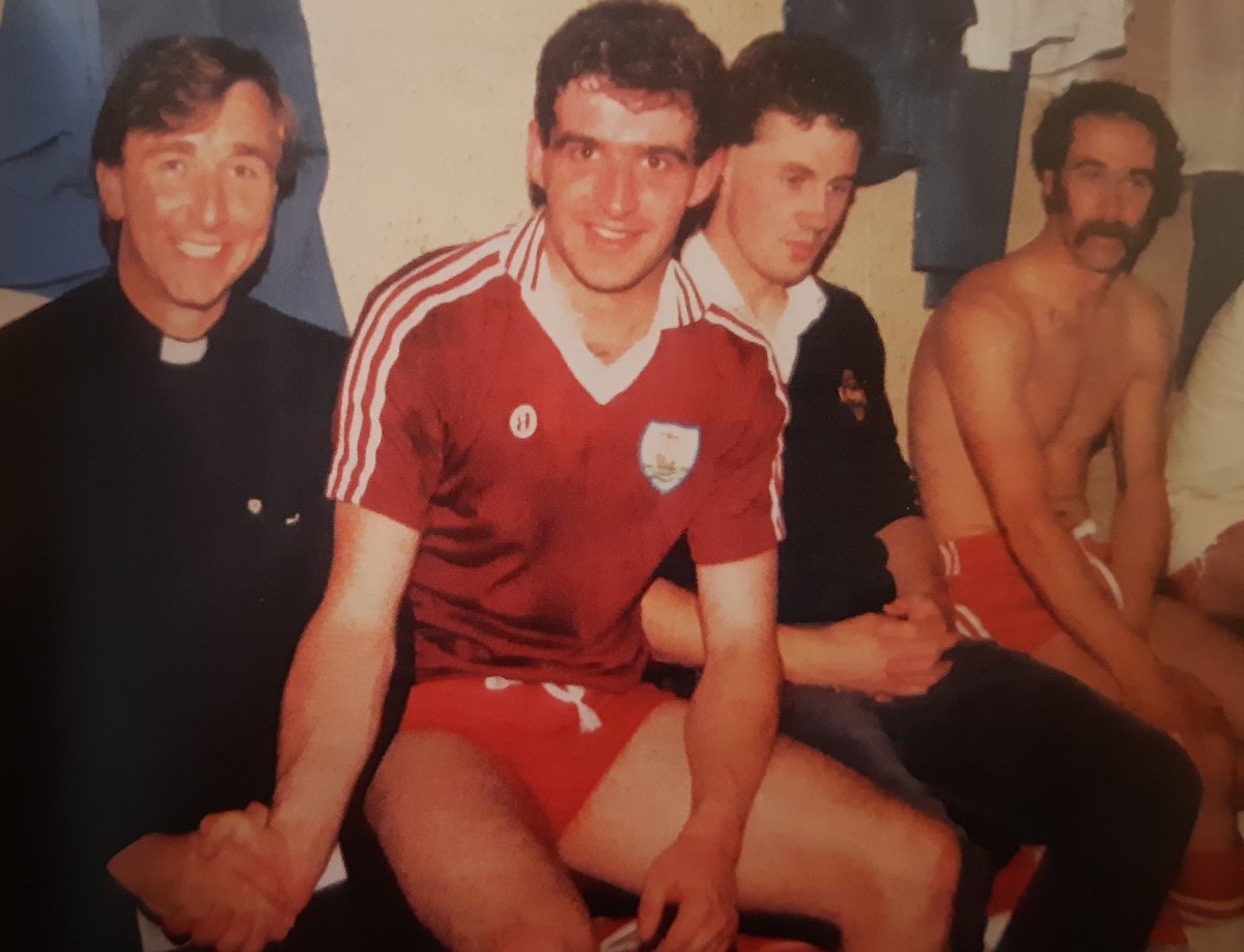 AodhanHarkin's tweet photo. Tyrone players along with Fr Brian Darcy after beating Galway in the 1986 All Ireland semi-final. @murphysgloves @TyroneGAALive @teamtalkmagLIVE @tarlynch43 @DamianMcLernon @GerardO86647758 @MoysPhillyMc @_johnball_1 @bod_uherald @GAARetroPics @C_Na_nGael @drumquingaa @Sport_UH https://t.co/XFK59sGh7V