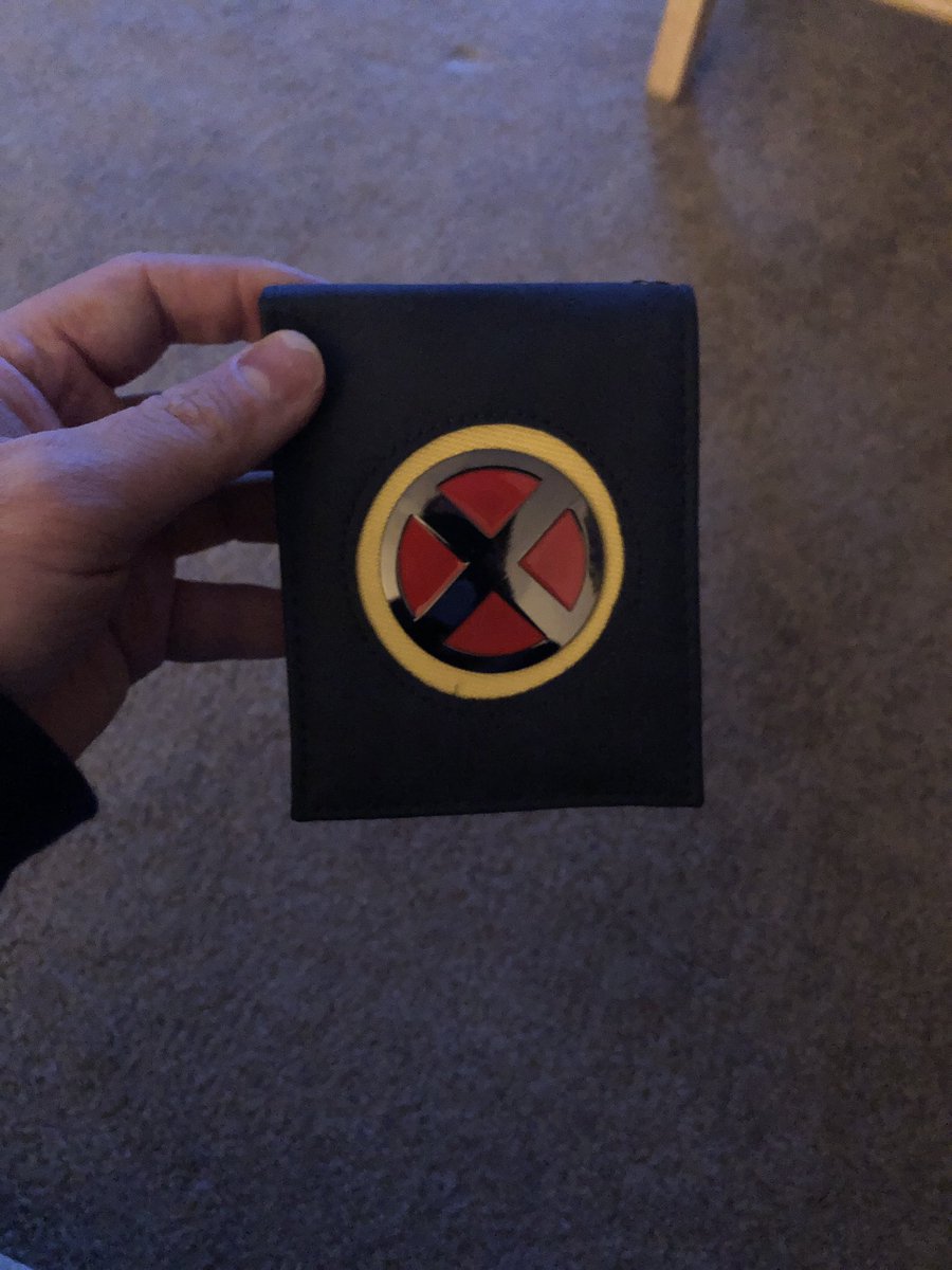 ShainByrd's tweet photo. What do y’all think of my new wallet? I got and the trash bin for free as the pillow was my most expensive item. #XMen #TheLittleMermaid #PartOfYourWorld #Boxlunch #clearance #BuyOneGetTwoFree https://t.co/yG5BslND6w