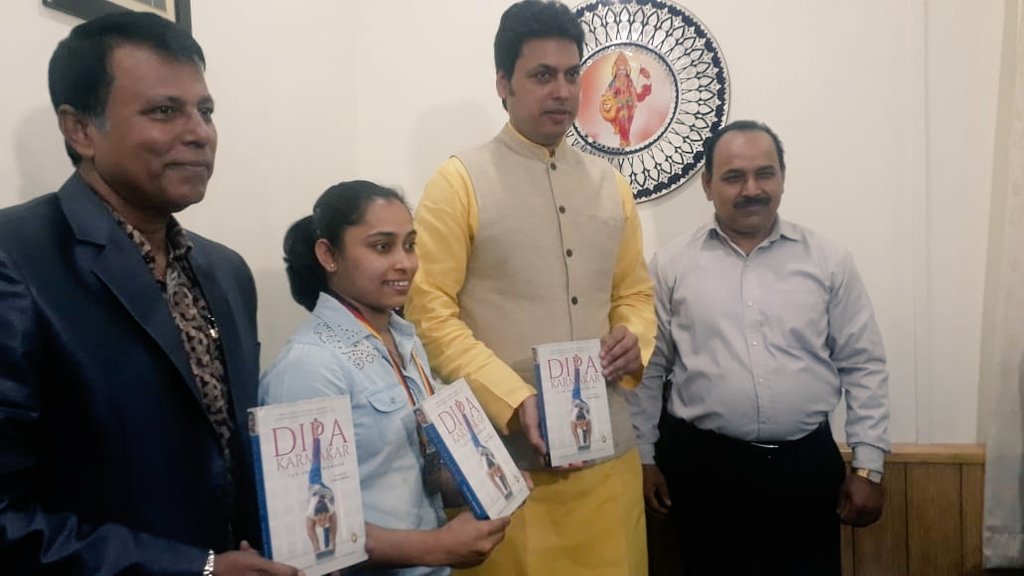 DipaKarmakar's tweet photo. A very positive note to end 2018 on. Presented a copy of my autiobiography The Small Wonder to our dynamic CM @BjpBiplab Sir. Expect Tripura to regain its supremacy in Gymnastics in all age groups with his backing for our sport. #TheSmallWonder https://t.co/Ta1fSOPuoE