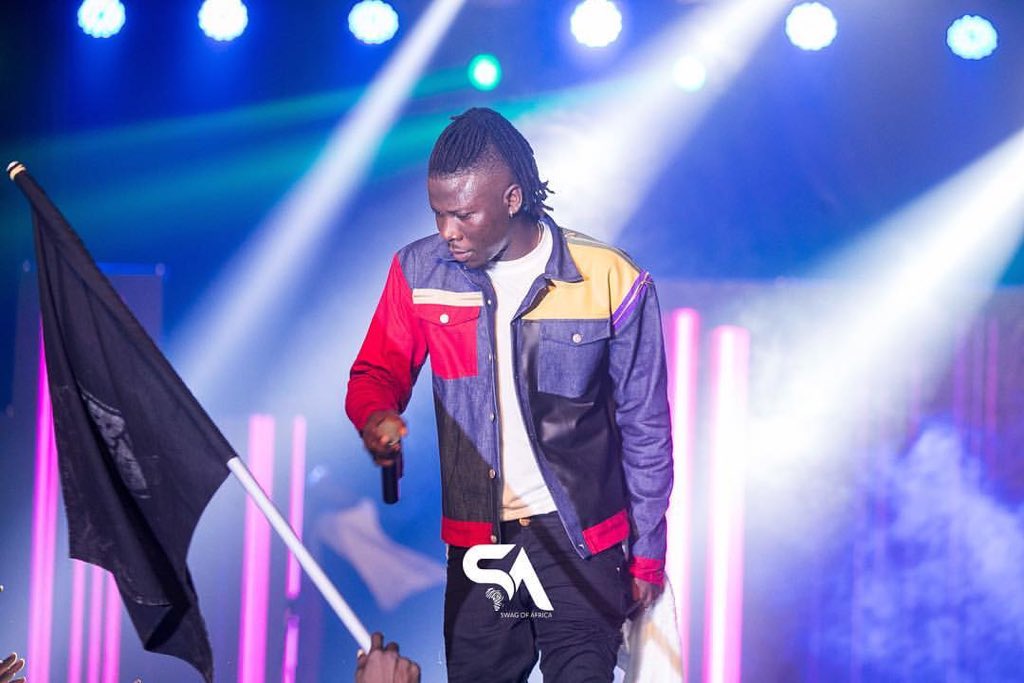 attotetteh's tweet photo. Coat of many Colours. The Stonegod @stonebwoyb in a Custom made Atto Tetteh Denim-Leader Jacket.
Styled by :@TrendyRail 💉
#Attotetteh #BhimConcert #bhimnation #BhimConcertDEC28 https://t.co/YO4sW0Jg4E
