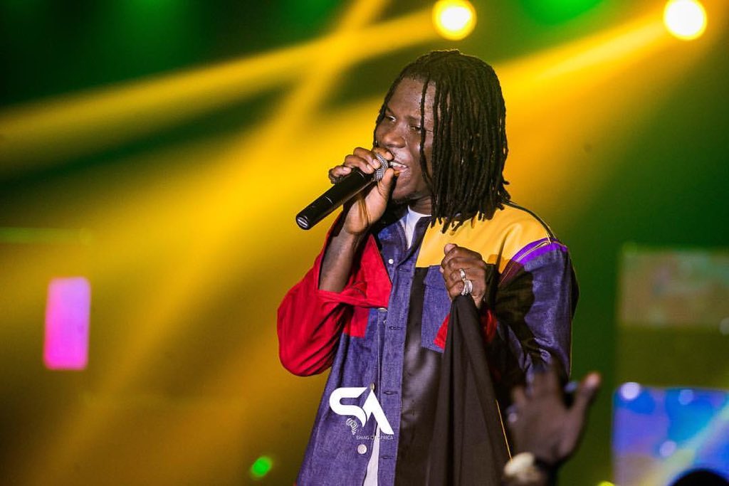 attotetteh's tweet photo. Coat of many Colours. The Stonegod @stonebwoyb in a Custom made Atto Tetteh Denim-Leader Jacket.
Styled by :@TrendyRail 💉
#Attotetteh #BhimConcert #bhimnation #BhimConcertDEC28 https://t.co/YO4sW0Jg4E