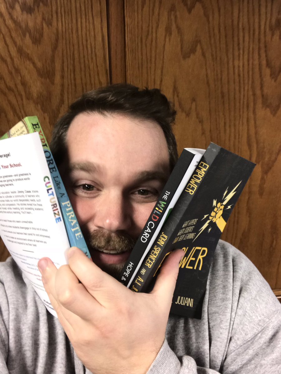 drmcclard's tweet photo. A little #DBCbookface sandwich with four great books! #tlapgift18 #empower #culturize #xplap #WildCard https://t.co/Oy3XeeG2Ht