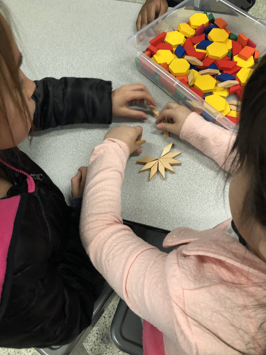 Elem_InnovaSHAN's tweet photo. Ms. Johnson and Mrs. McGrathโs Ss worked together to create symmetrical snowflakes using pattern blocks. These #firstgraders learned about the number of sides and names of shapes as well as symmetry @Henrico_Steam #idreamofsteaming #winterSTEAM #snowflakestem #steamteacher https://t.co/CfNLT1XphN
