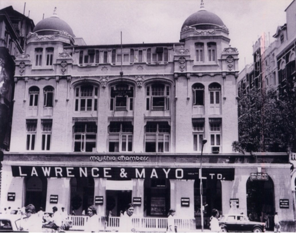 Old black and white photo of Majithia Chambers on D. N. Road in Mumbai showing Lawrence and Mayo sign board. Photo from 1960.
