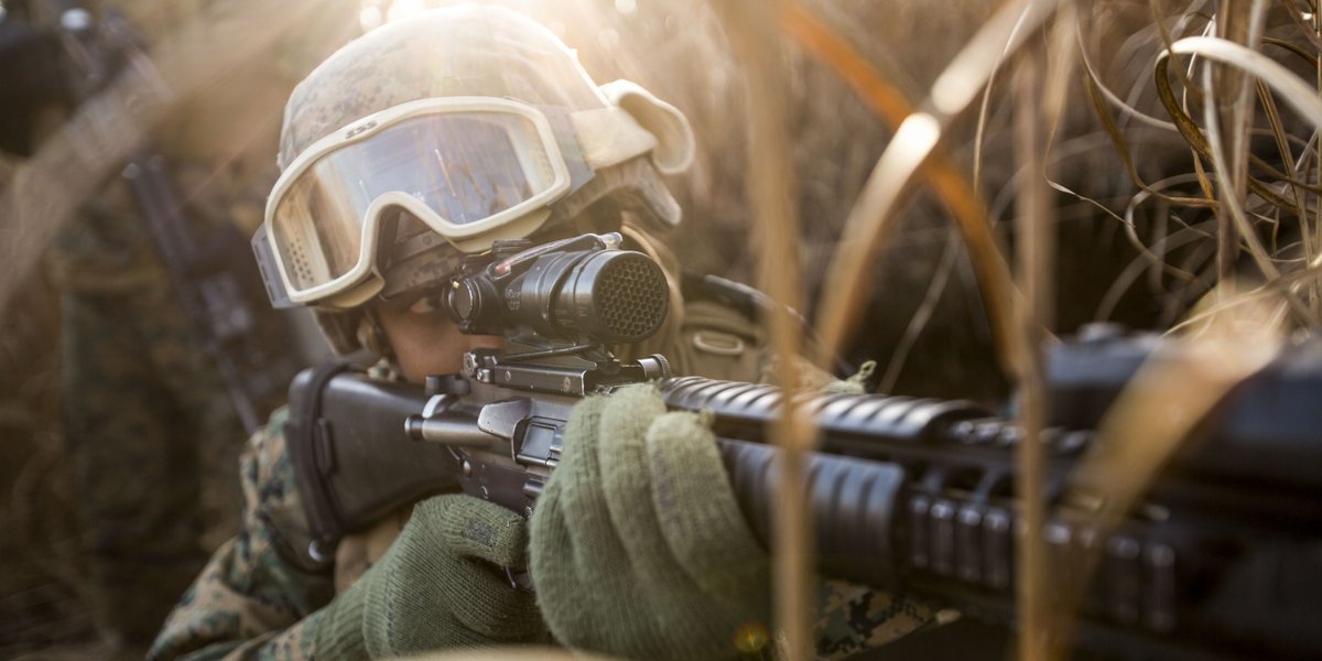 Sight In
A Marine with 3rd Marine Division patrols while conducting 'Reconnaissance and Selection of Position' training at the Combat Arms Training Center on Camp Fuji, Japan.
