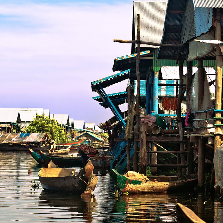 DWCvolunteer's tweet photo. Everything floats in the otherworldly, floating villages of Cambodia, including hope. There’s still time to join a DWC team this March. Explore temples, houses, schools and stores that balance on tree-trunk stilts. #volunteerDWC https://t.co/evFc7U7daS https://t.co/L5HjyzmCLM