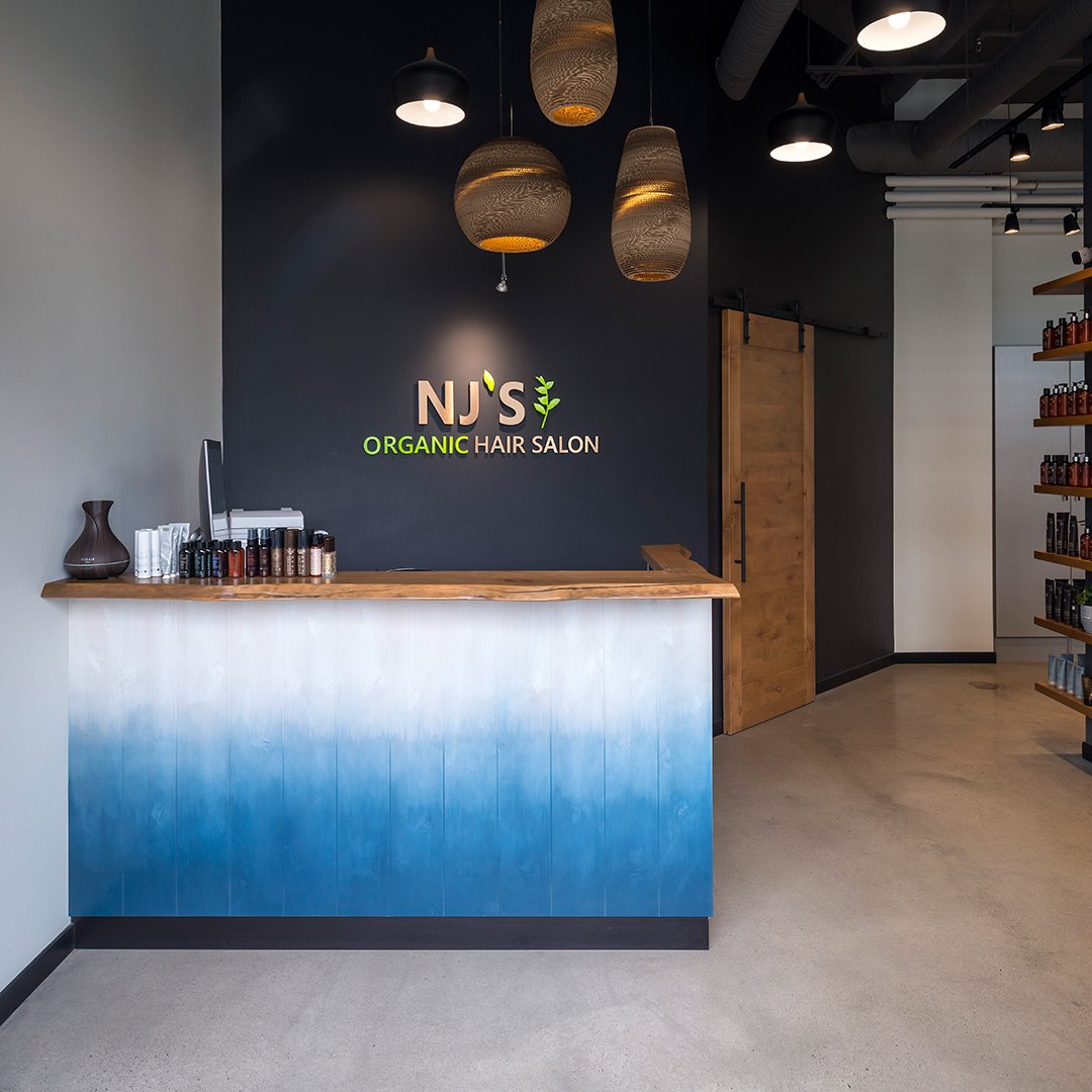 FADED | A unique and creative reception desk in any situation will help your brand stand out. #BecauseGoodDesignIsGoodBusiness #commercialinteriordesign #interiordesign #reception #salon #retail #organic #hair #ombre #fade #blue #brand #unique #kelowna #okanagan #ylw