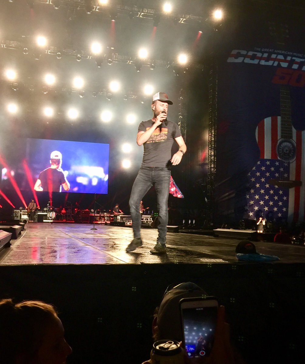 mikemoore2014's tweet photo. It’s #NationalHatDay ! I’ll celebrate by posting a couple of my favorite pics of @DierksBentley wearing a #VoteMikeMoore hat on stage last year https://t.co/axNCozEsjR