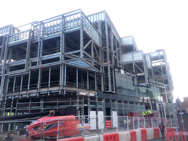 QuestSolUK's tweet photo. Progress this morning on Rochdale Riverside project with @WillmottDixon, As works continue on the West elevation, as our team are glazing ceramics, insulation & EPDM works and North elevation, the team have begun to building grid work, bolting up, prep for Glazing. #QuestSol https://t.co/ZLKYGcjt9Q