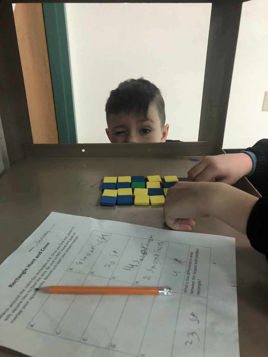 “No gaps, no overlaps” as 2nd graders hunt &amp; cover rectangles to measure area! #makingmagichappen #wearedegan