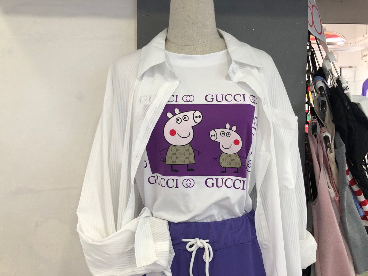WarrenWhyteUK's tweet photo. A few interesting fashion items spotted last year in Chengdu. #Gucci #PeppaPig #TescoValue #Carling #justdoit https://t.co/niV6GWZOcC