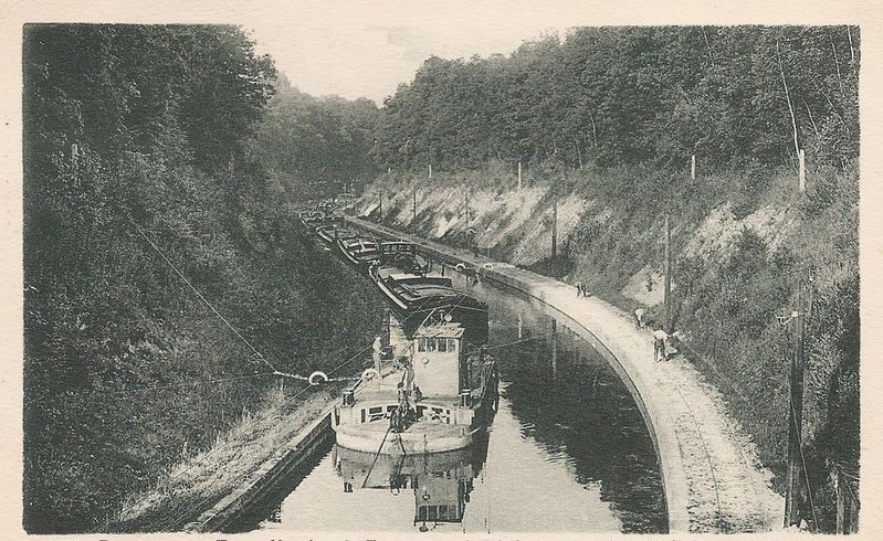 172. This properly delighted me when I found it. You know what a trolleybus is, right? Buses powered by overhead electric wires. Great stuff. WHAT IF, though, it was in fact a trolleyboat? Perfect for travelling canals, replacing horse-drawn boats.