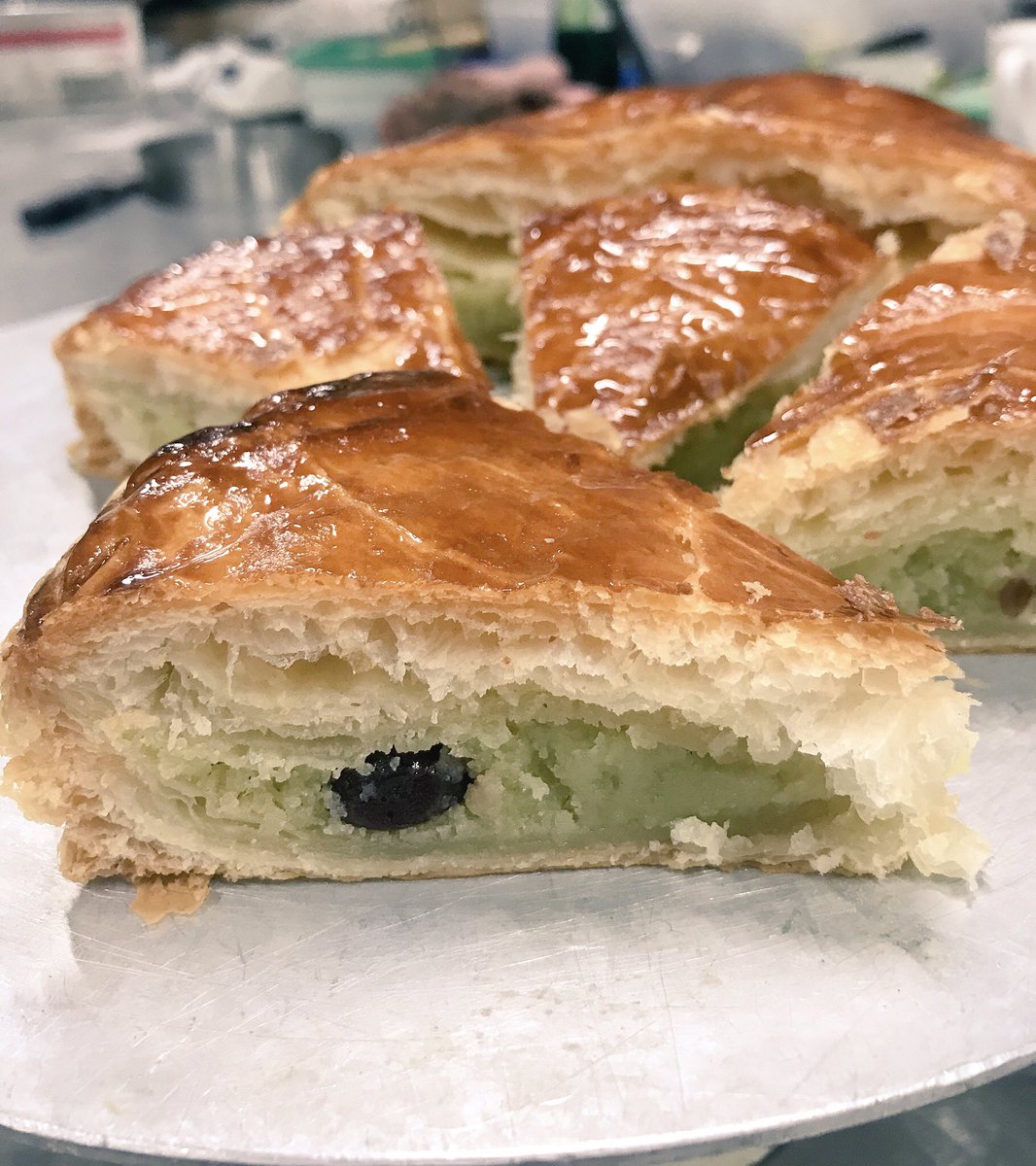 Galette Des Rois 👑 🍒 

Puff pastry filled with a pistachio and almond cream &amp; morello cherries!