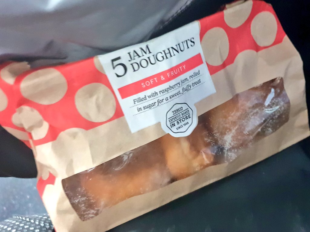 sliceandserve's tweet photo. When you're last one in office and they've left a sealed bag of jam doughnuts behind. I mean, they'll be stale by Monday so... #TGIF #onlythreeleft #commuting https://t.co/AaWrxMQYuy