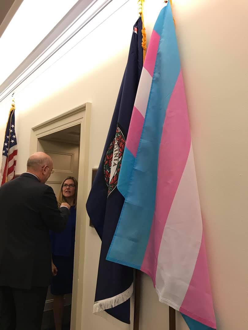 A trans equality flag hangs outside Rep. Jennifer Wexton's congressional office.