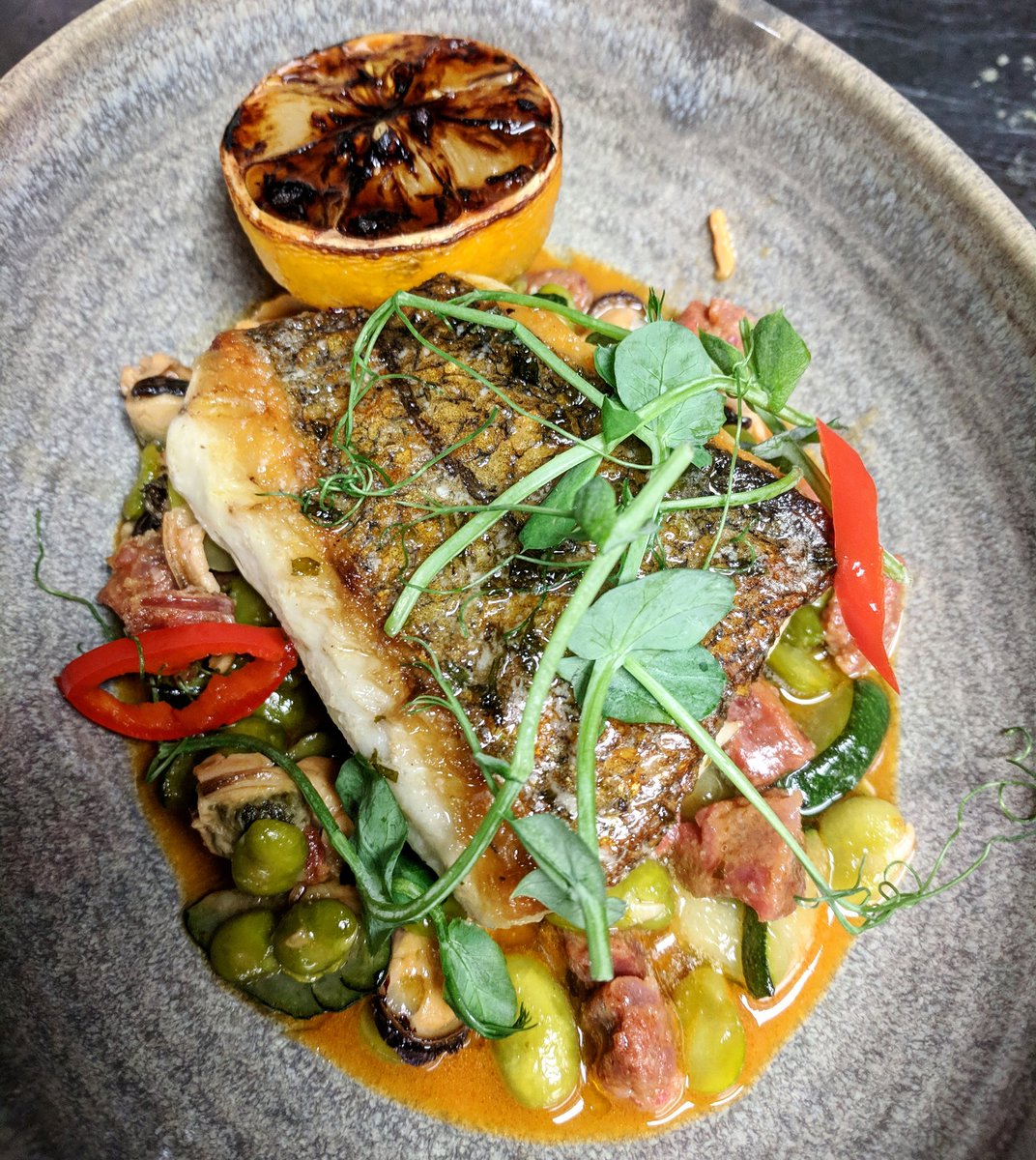Boma_Green's tweet photo. Hake fillet, mussels, 'nduja, broadbeans. This with a glass of vermentino and some live music at Boma Green makes for a pretty strong Friday!
#bomagreen #parsonsgreen #sw6 #foodporn #londonrestaurants #boma https://t.co/q91JCv7Fjb
