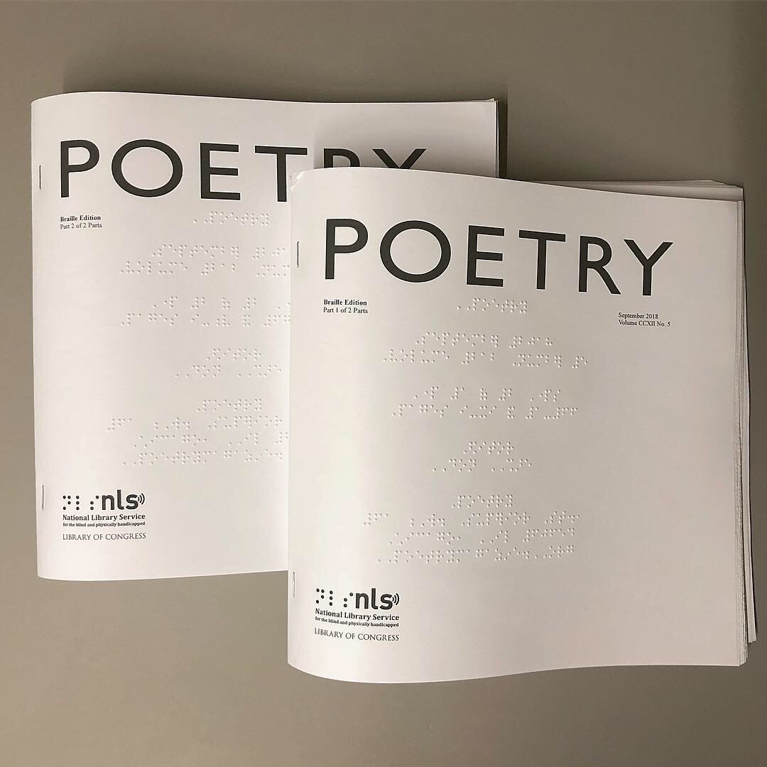 Two braille issue of POETRY. Large, white booklets with some black text and braille.
