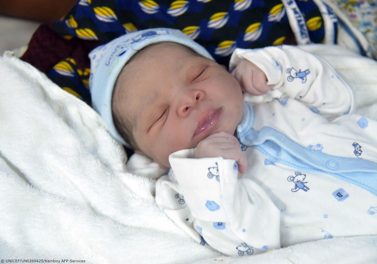 A newborn baby girl sleeps at a hospital in Abidjan, Ivory Coast.