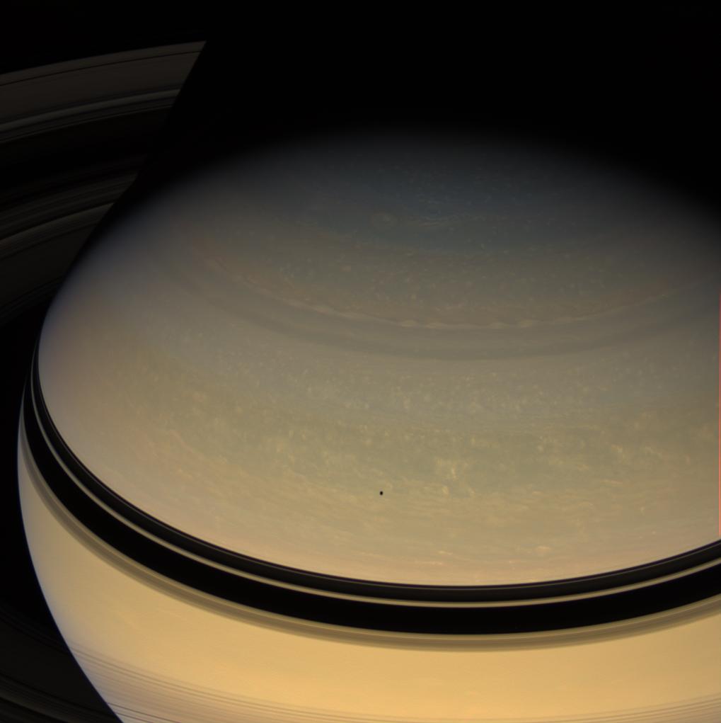 Over the Top: Saturn dominates this colorful view, taken from a vantage point high above the rings dailyrings.org/2019-01-04