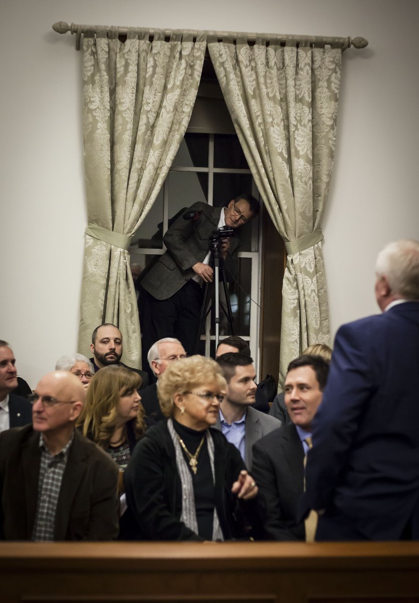 freelphoto's tweet photo. My 2 favorite images from last night's Freeholder reorganization meeting. 1)County Website manager Thor Carlson sets up his camera in a window. 2 Freeholder Josh Hertzberg's son Callum peeks through from under his father's arm during the oath of office. #SussexCountyNJ #njherald https://t.co/YL30MBhm1p