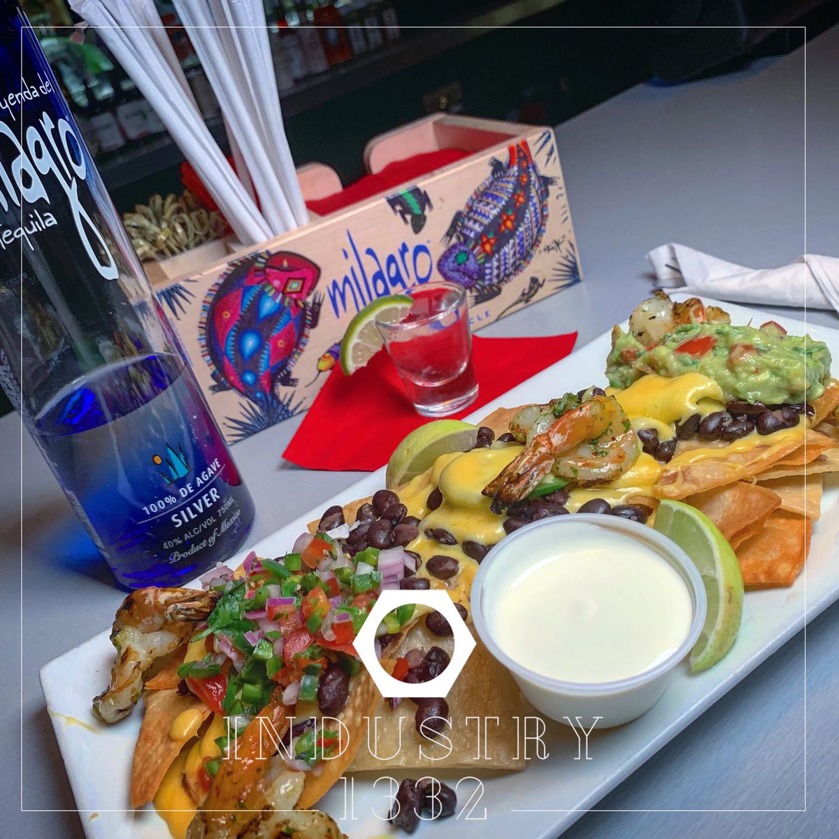 Industry1332's tweet photo. Weekend Special 🍤 Shrimp Nachos 🌽 Housemade fresh corn tortillas fried to perfection paired with a shot of @milagrotequila 😋 #industry1332 #specialfortheweekend #backbypopulardemand #industry1332iswhereitsat #firstweekendoftheyear #shots #tequila #milagro https://t.co/VL2qvqffRa