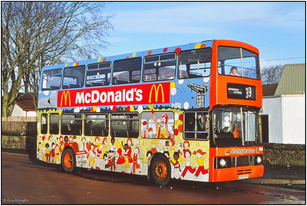 Double decker bus covered in McDonald’s adverts