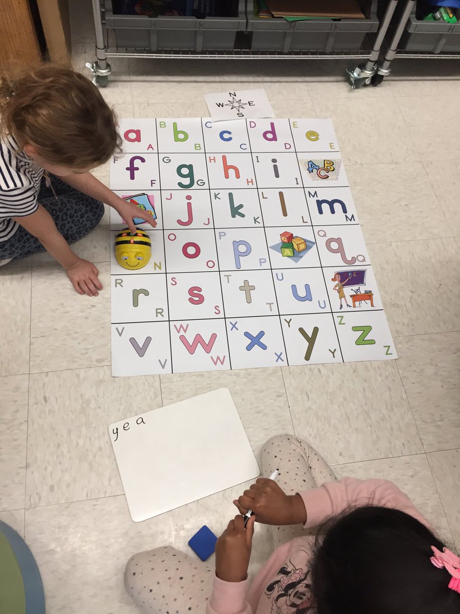 msmyers's tweet image. Celebrating the new year w/ 1st grade partners working w/ #BeeBots following cardinal directions to solve word mysteries. #offlinecoding #computerscience #robotics