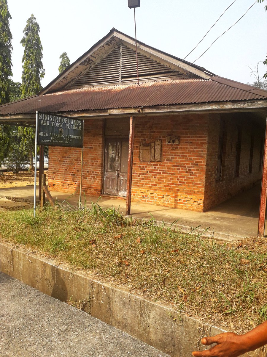 Here is a picture of me at the Opobo District Office. A signpost with the inscription “Ministry of Lands and Town Planning” has been erected in front of the District Office.