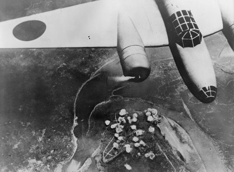 Japanese Ki-21 bomber dropping bombs on Chongqing, China. 14 Sep 1940; note Yangtze River belowSource: United States Library of Congress