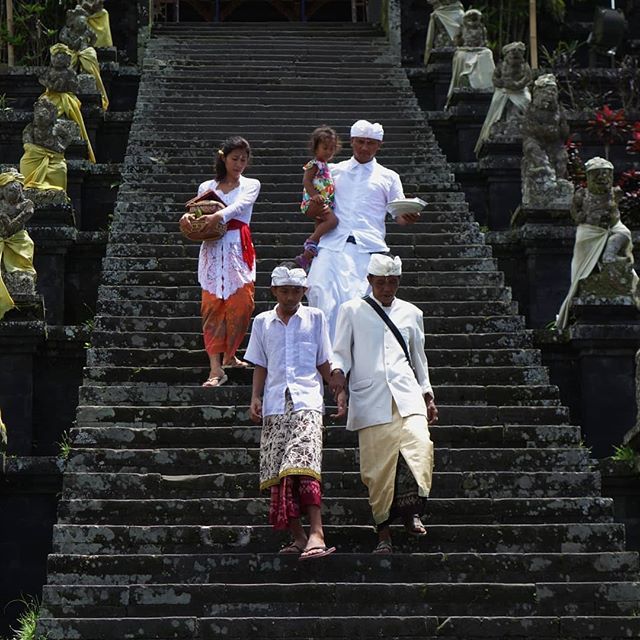 Worshippers walking down from the Besakih Mother Temple in Bali.

#besakihtemple #purabesakih #mothertemple #bali #baliindonesia #hindutemple #hinduism #hindufestival #indonesia #letsguide @obruch bit.ly/2RcnVzT