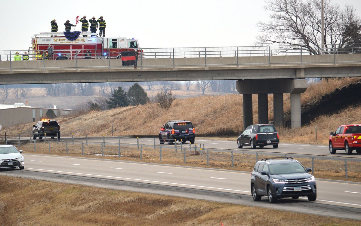 WBTimes's tweet image. Members of the @CityofWB fire department salute from atop the Parkside Drive bridge while a hearse carrying the body of @ClintonFire1890 Lt. Eric Hosette passes by Sunday afternoon. Hosette died in an explosion that also critically injured another firefighter on Saturday.