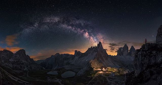 ScienceAlert's tweet photo. 😍 It looks like a scene straight out of a gorgeous and epic fantasy movie - but this is a real image of the Milky Way over the Dolomite mountain range at Tre Cime in Italy. 
This image was highly recommended for the Insight Investment Astronomy Photographer of the Year and c… https://t.co/xt4WqBLcte
