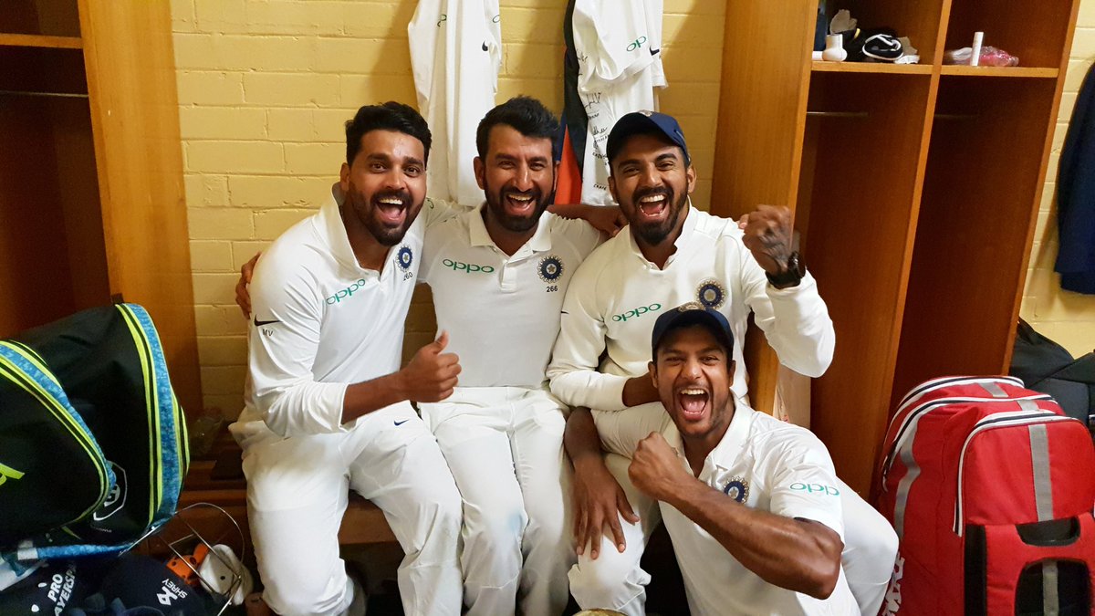 BCCI's tweet photo. Some happy faces in the dressing room post the Historic win 🇮🇳🇮🇳📸 #TeamIndia #AUSvIND https://t.co/nVosuIEwlt