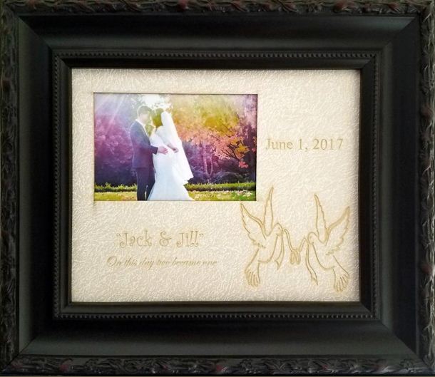 ProFrameCo's tweet image. The frame pictured is a Vintage Black Scoop frame, with a Rose Pink mat, laser etched with a pair of doves holding a ribbon in the unity of love. 

See the frames at ow.ly/oTVN30naRX7 
#PersonalizedFrames #personalizedgift #weddingframes #giftframes #officialdiplomaframes