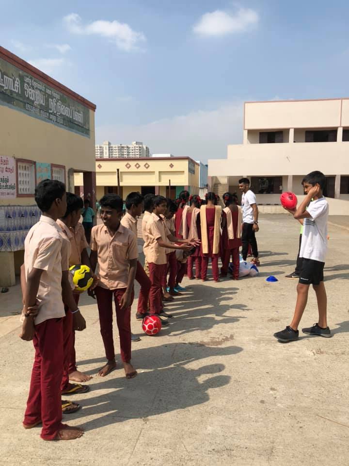 LIABIndia's tweet photo. Allison Arandez along with her sons @bakesss96 and Caleb Baker visited LIAB Semmancheri school on the 3rd January. They're from Australia and reached out to us as they wanted to donate balls and teach LIAB kids the basics of Australian football. 
It was a great day for the kids. https://t.co/PI5Zf5OKOy